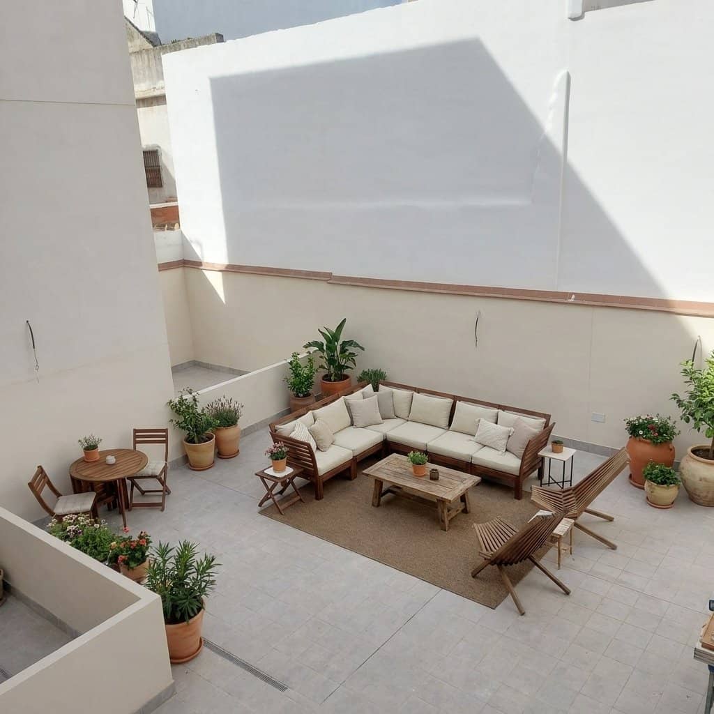 Recreación de la terraza al patio interior del Edificio Nuestra Señora. Imagen generada con IA, no contractual